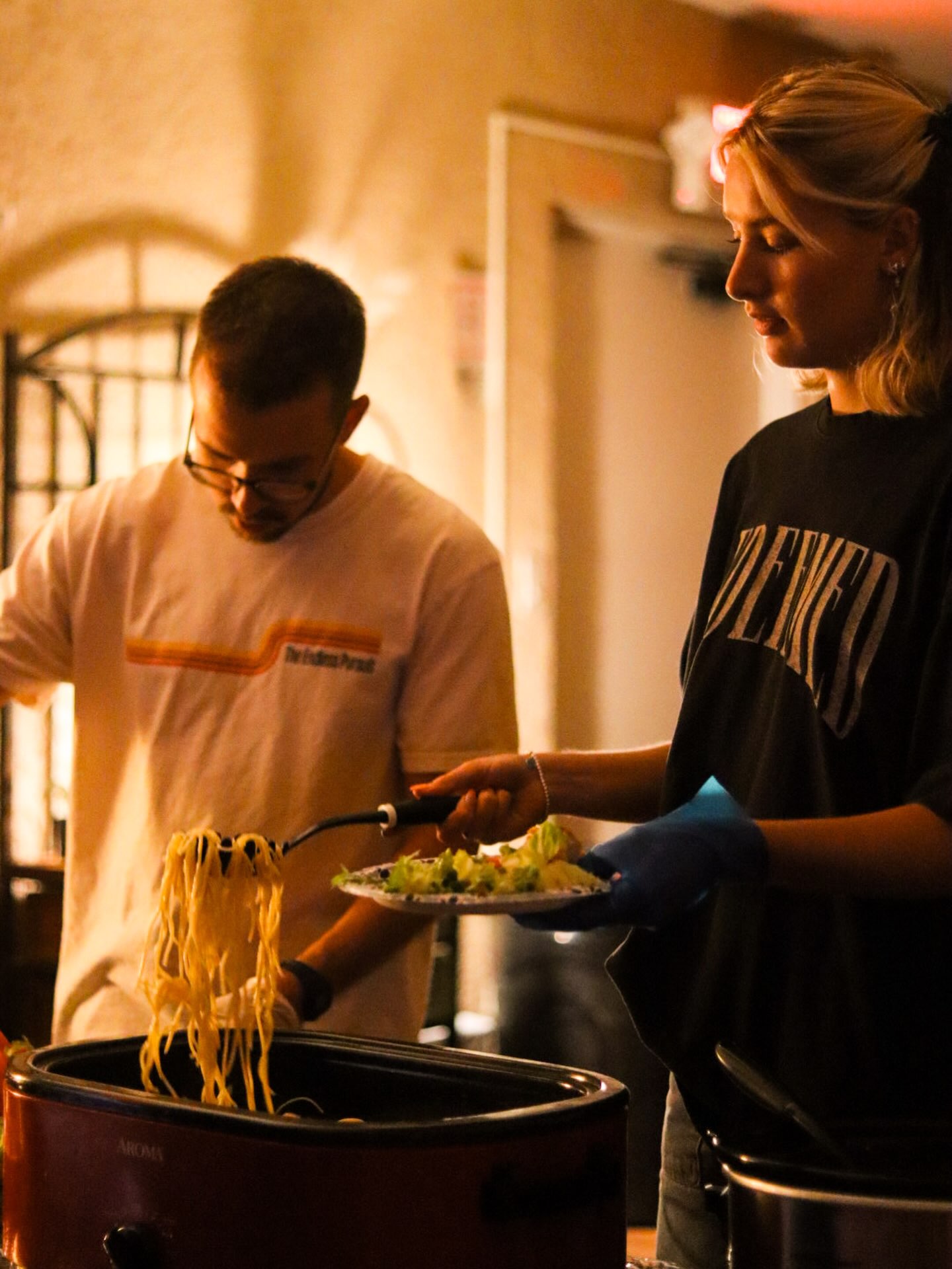 Volunteers serving a fellowship dinner at Fountain of Life